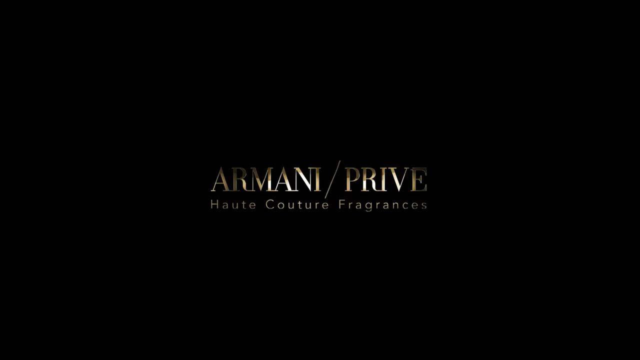 Logo of Armani Prive Haute Couture Fragrances in elegant gold typography against a black background.