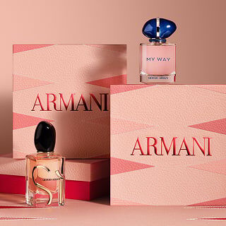 Flakons der Dufte Si und My Way von Giorgio Armani, prasentiert mit rosa Geschenkboxen der Marke.
