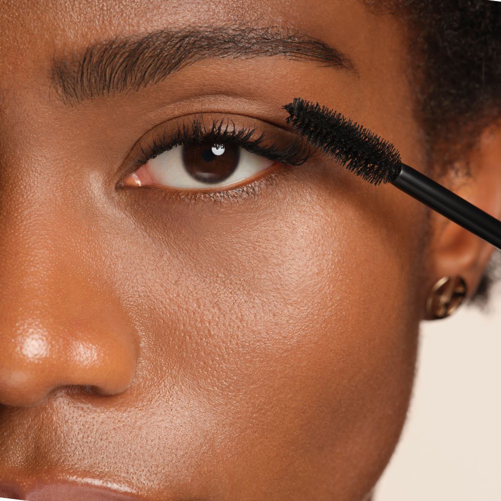 Applying Armani Beauty  VERTIGO DRAMA MASCARA to lift and define the lashes